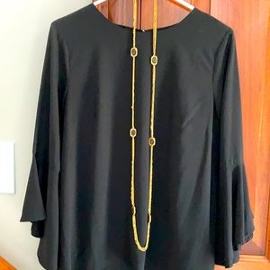 Long gold jeweled necklace